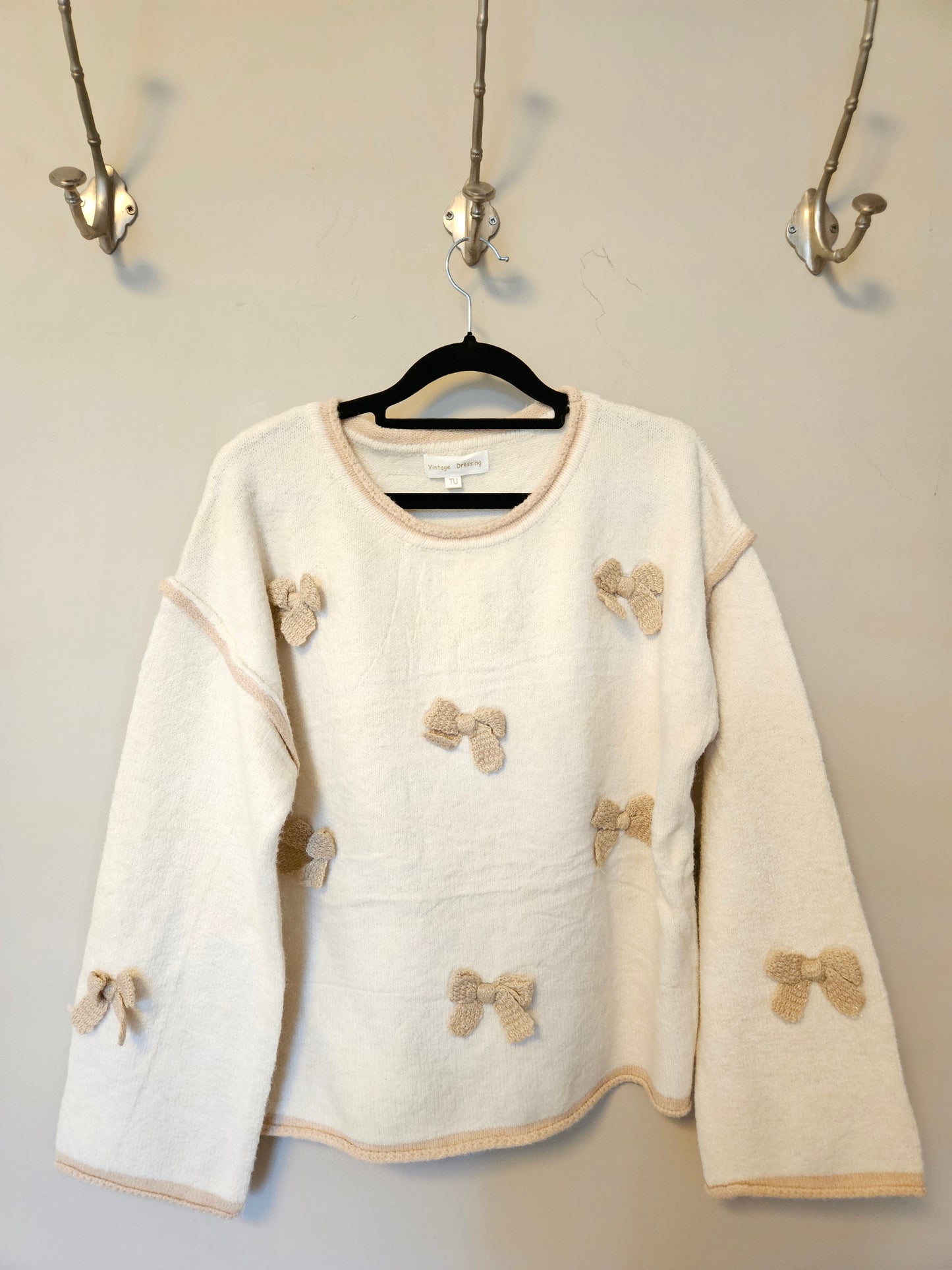 Trui met strikjes Ecru/Camel